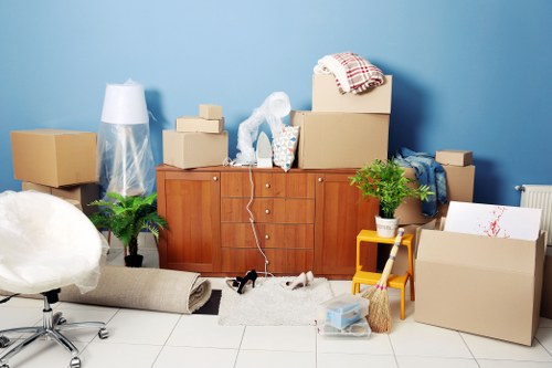 Moving van and packed boxes outside a Hither Green home