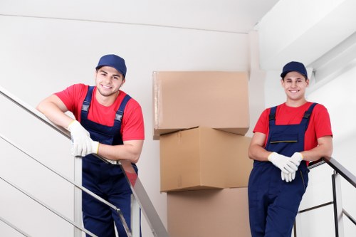 Careful loading of furniture into a local moving van
