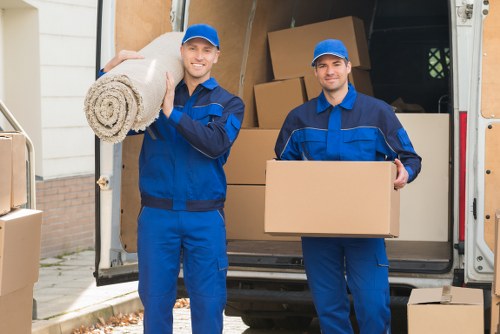 Removal team planning a move in a Hither Green residential street