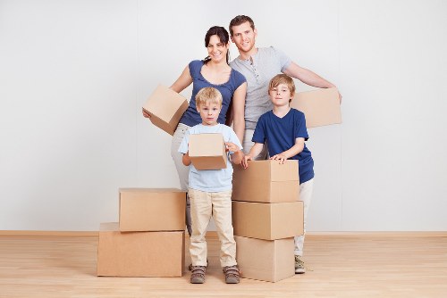 Boxes and furniture being loaded for a local move
