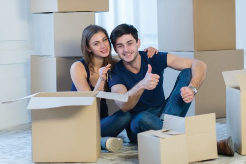 Checklist and packed boxes prepared for unpacking in a new Hither Green home