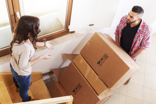 Mover using safe lifting practices with equipment