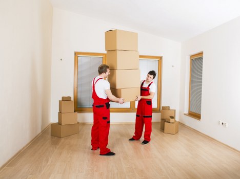 Loading furniture into a van for a local move in Hither Green