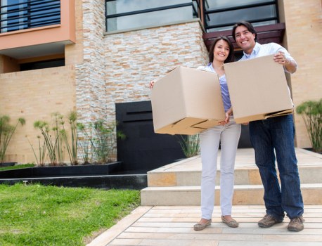 Moving team transporting household items from a flat in Hither Green